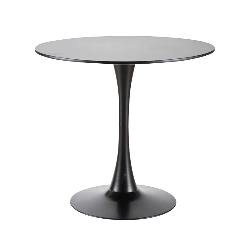 Black round dining table with pedestal base