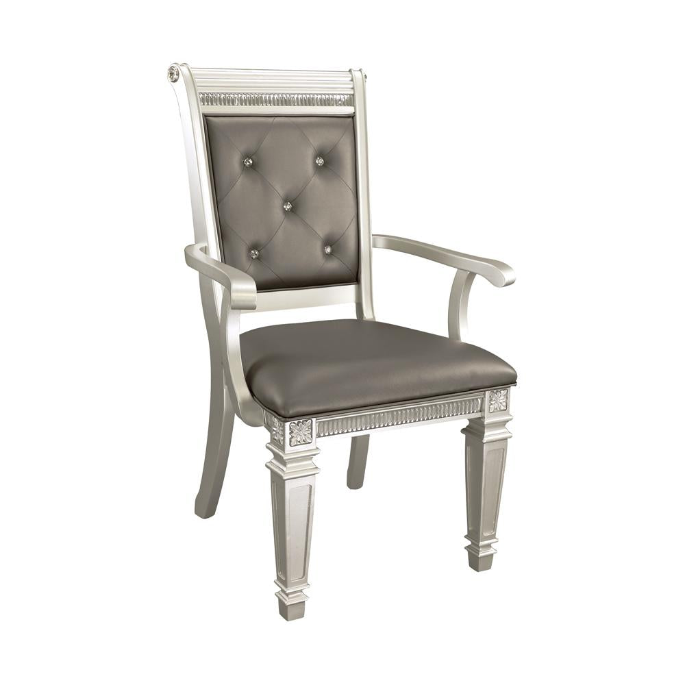 Tufted grey upholstered arm chair with silver wood frame and crystal accents