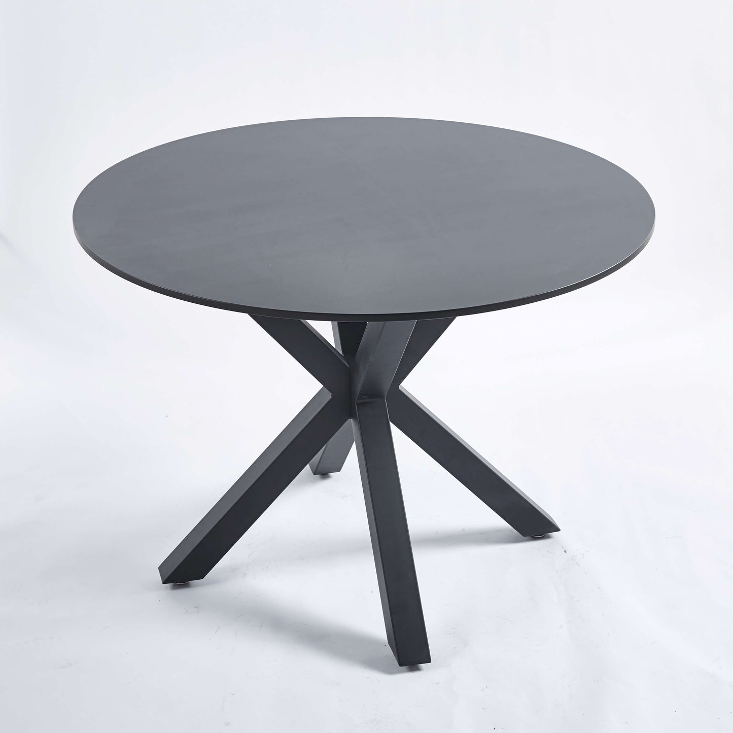Dark gray round dining table with a striking geometric base