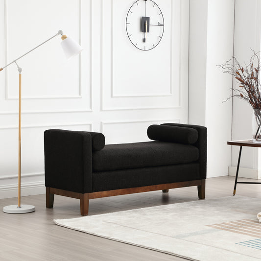 Black boucle bench with wooden legs and bolster arms