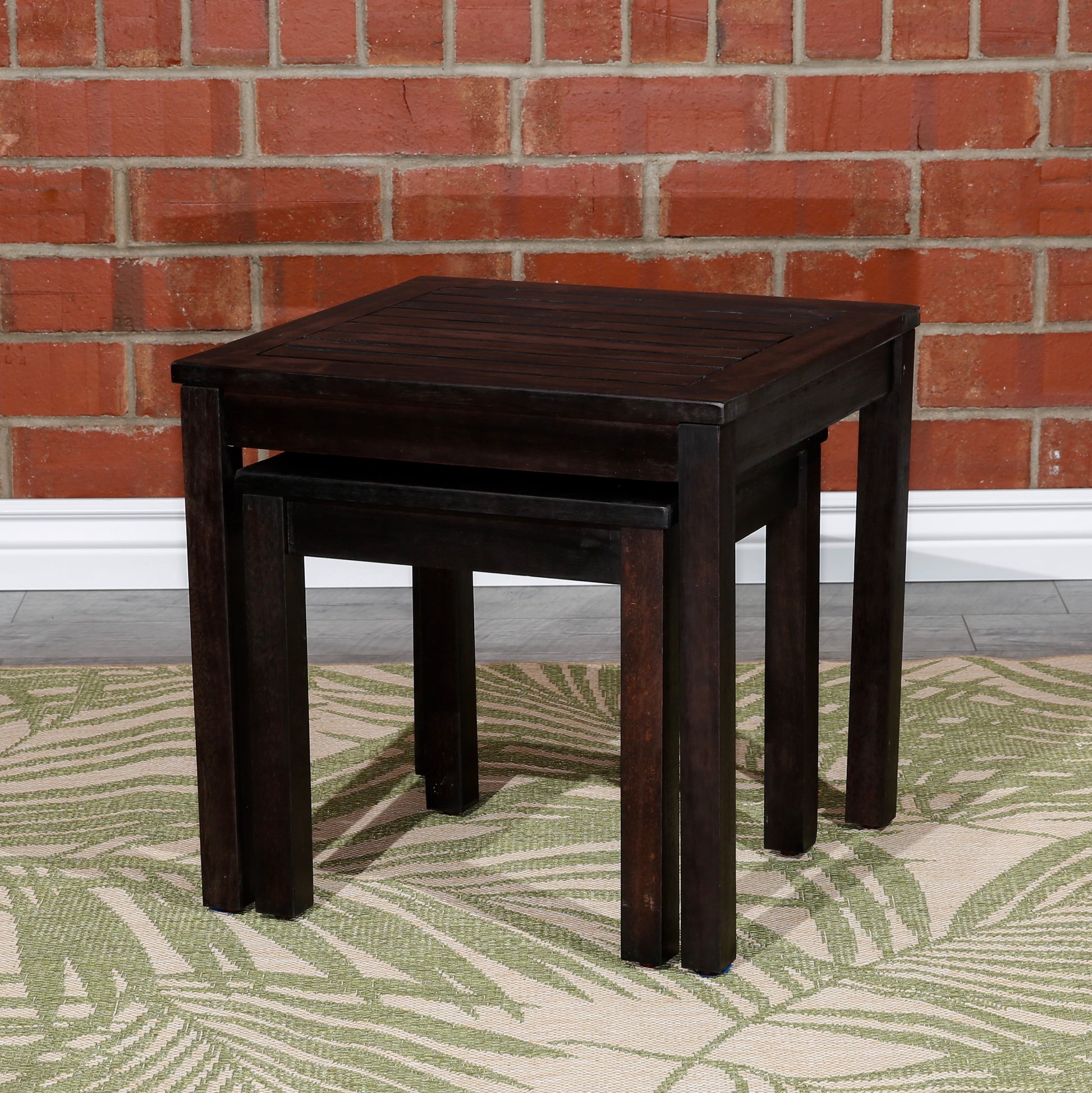Dark brown wooden nesting tables with slatted tops perfect for living rooms