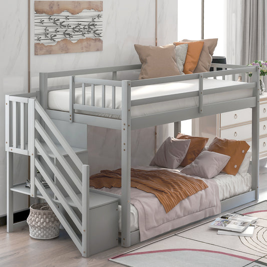 Gray twin over twin bunk bed with stairs