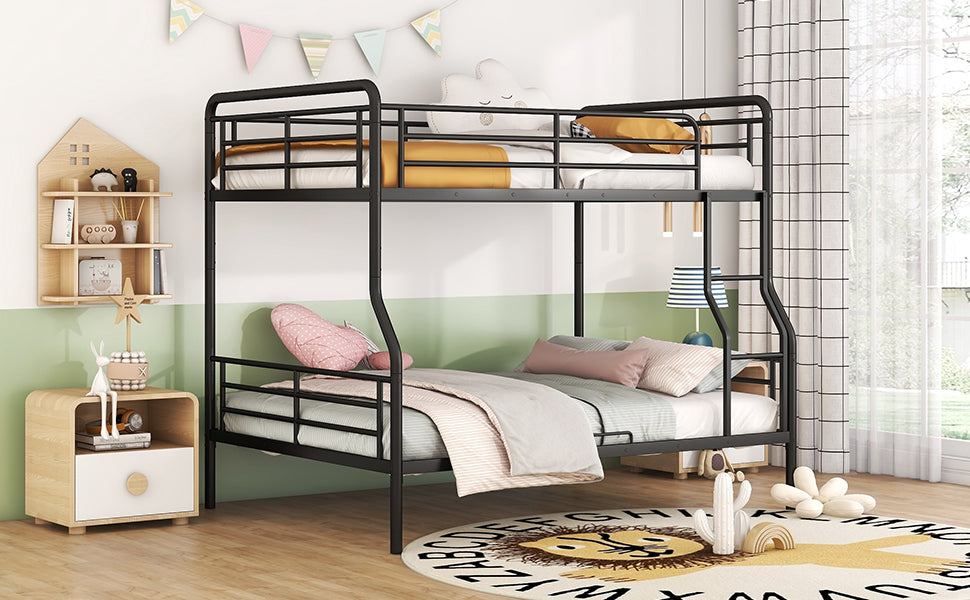 Black metal twin over twin bunk bed with white bedding and orange pillows