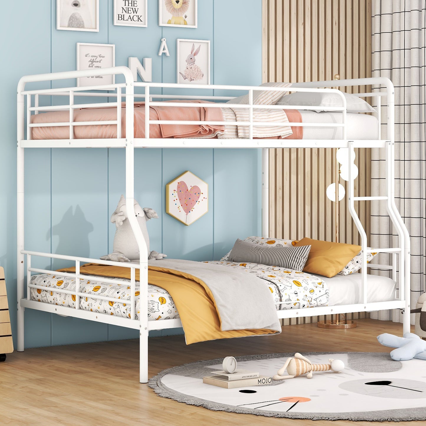 White metal twin over twin bunk bed with playful bedding