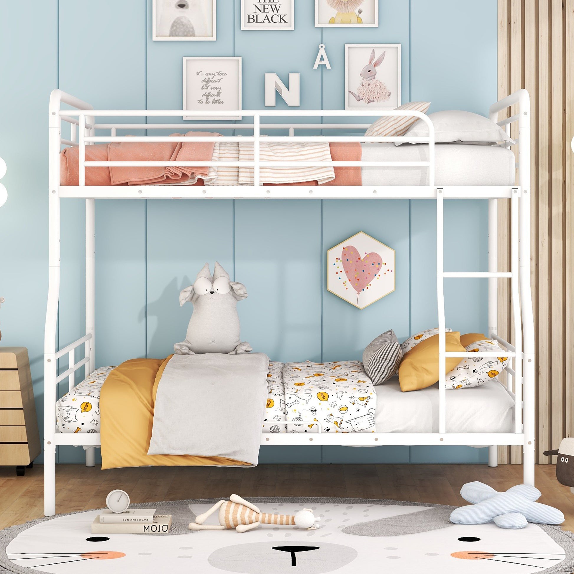 White metal twin over twin bunk bed with kids bedding