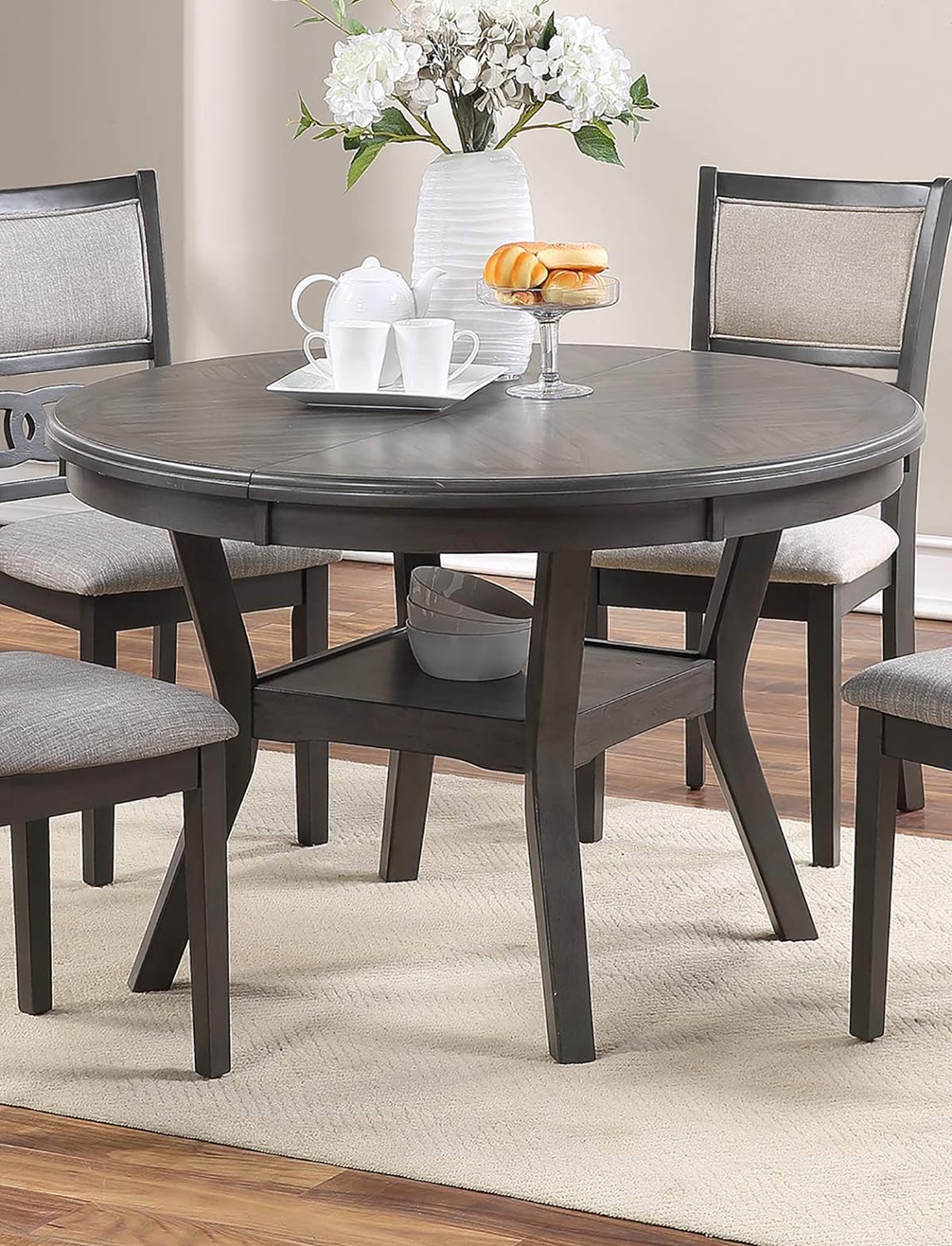 Dark grey round dining table with shelf