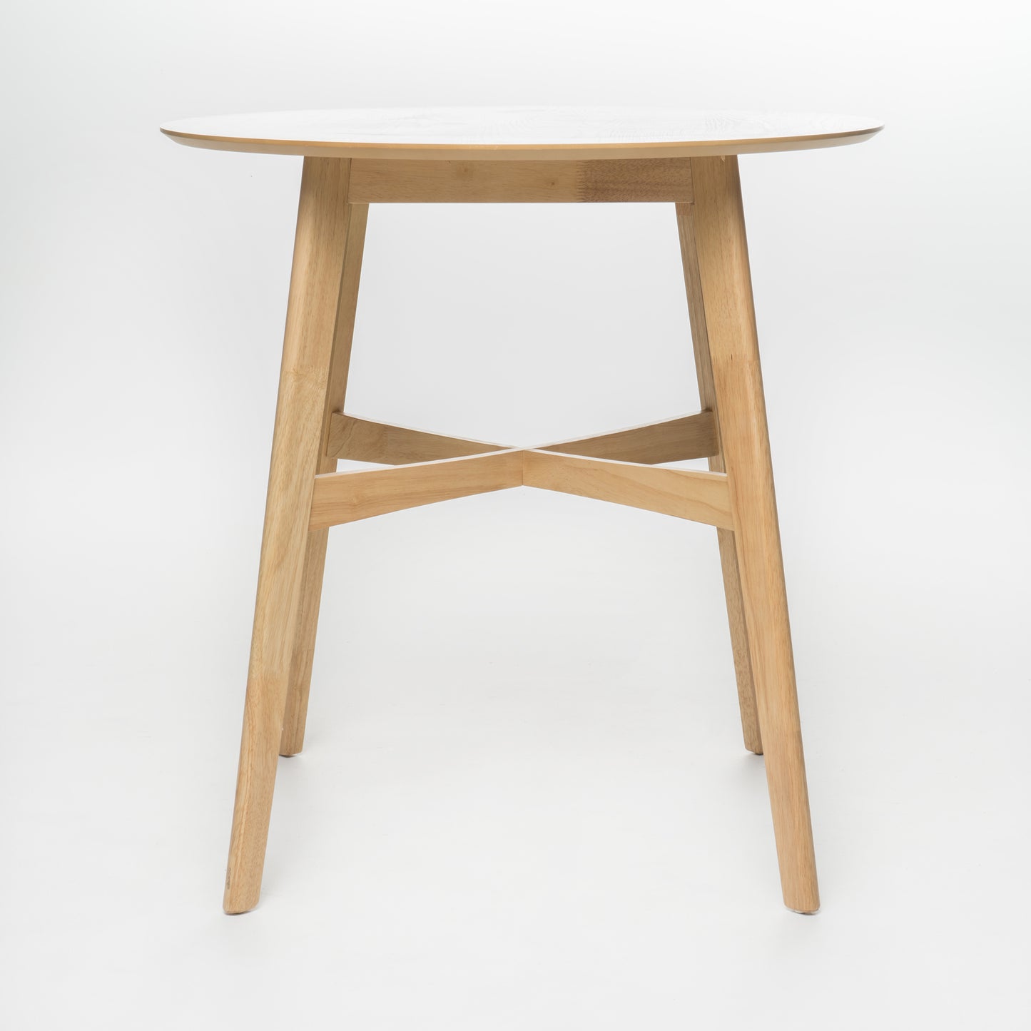 Round light wood dining table with tapered legs and cross brace