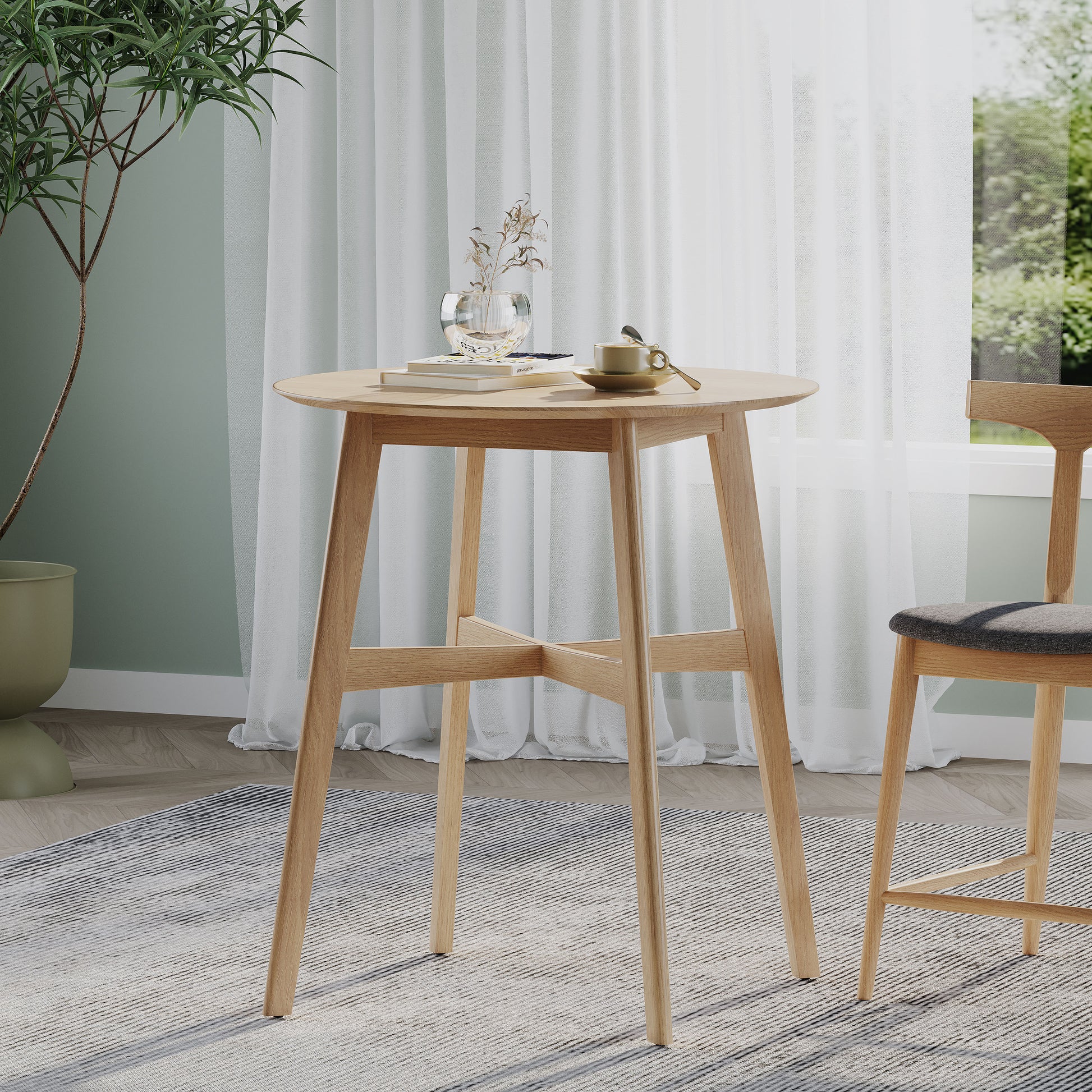 Round light oak breakfast table with minimalist design