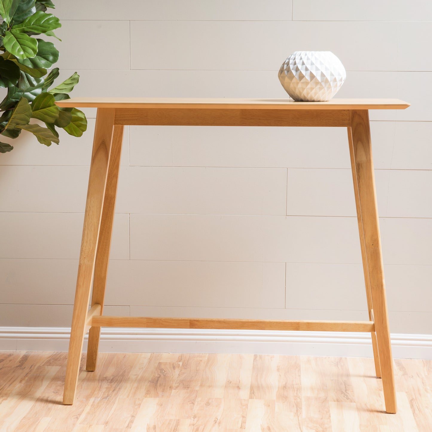 Minimalist light wood console table with angled legs