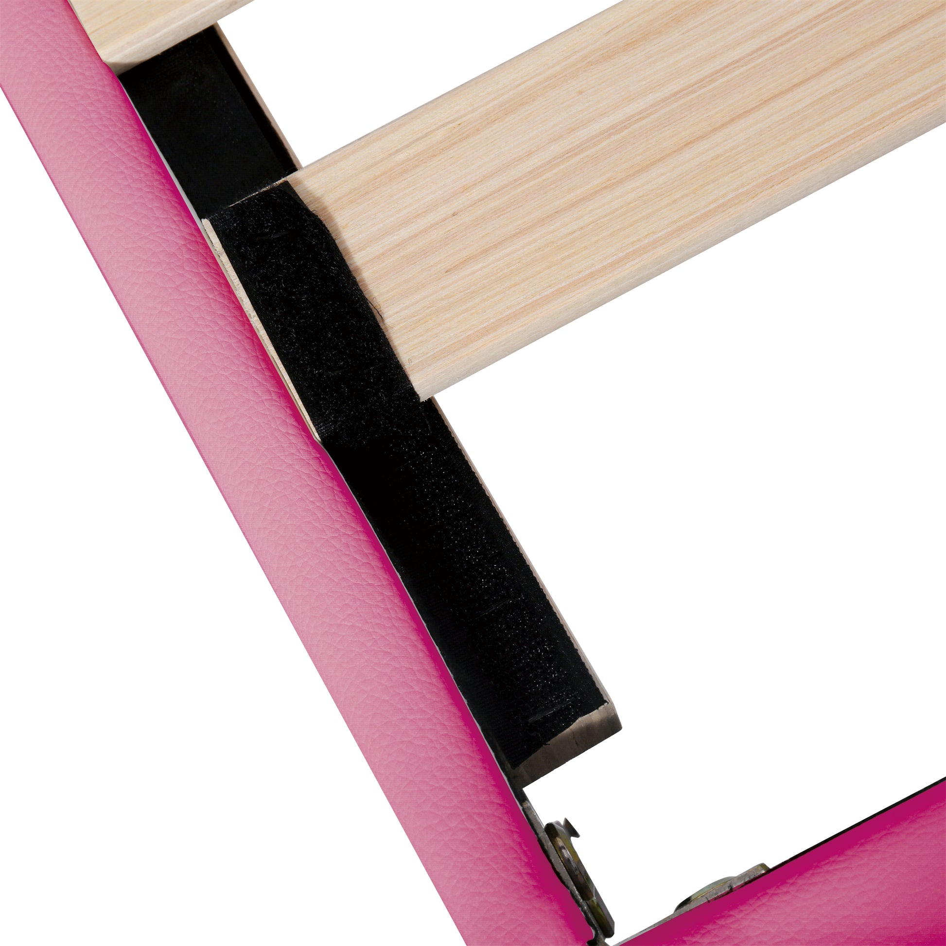Closeup of pink faux leather bed frame with wooden slats and black velcro attachment