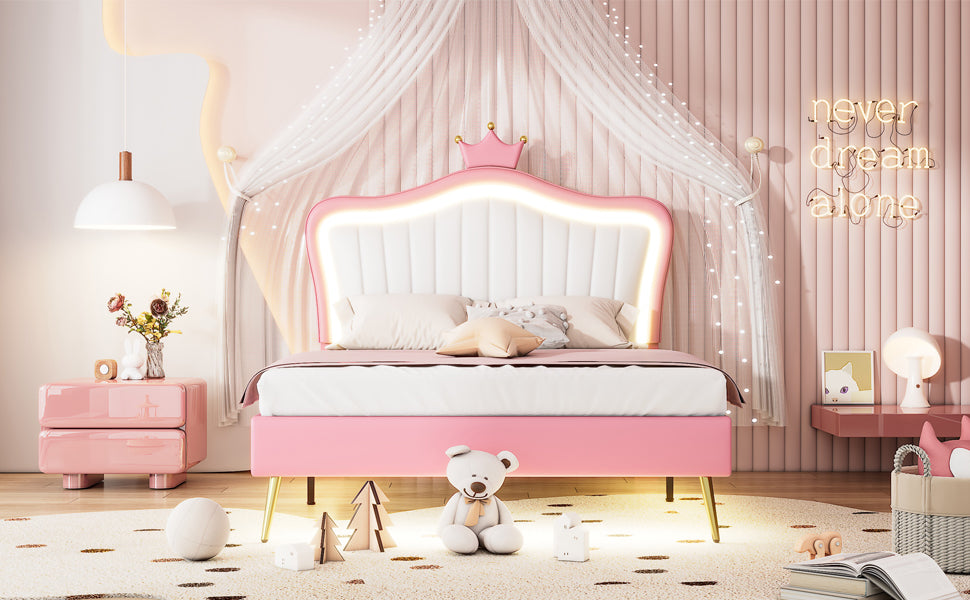 Pink upholstered twin bed with crown headboard and LED light trim