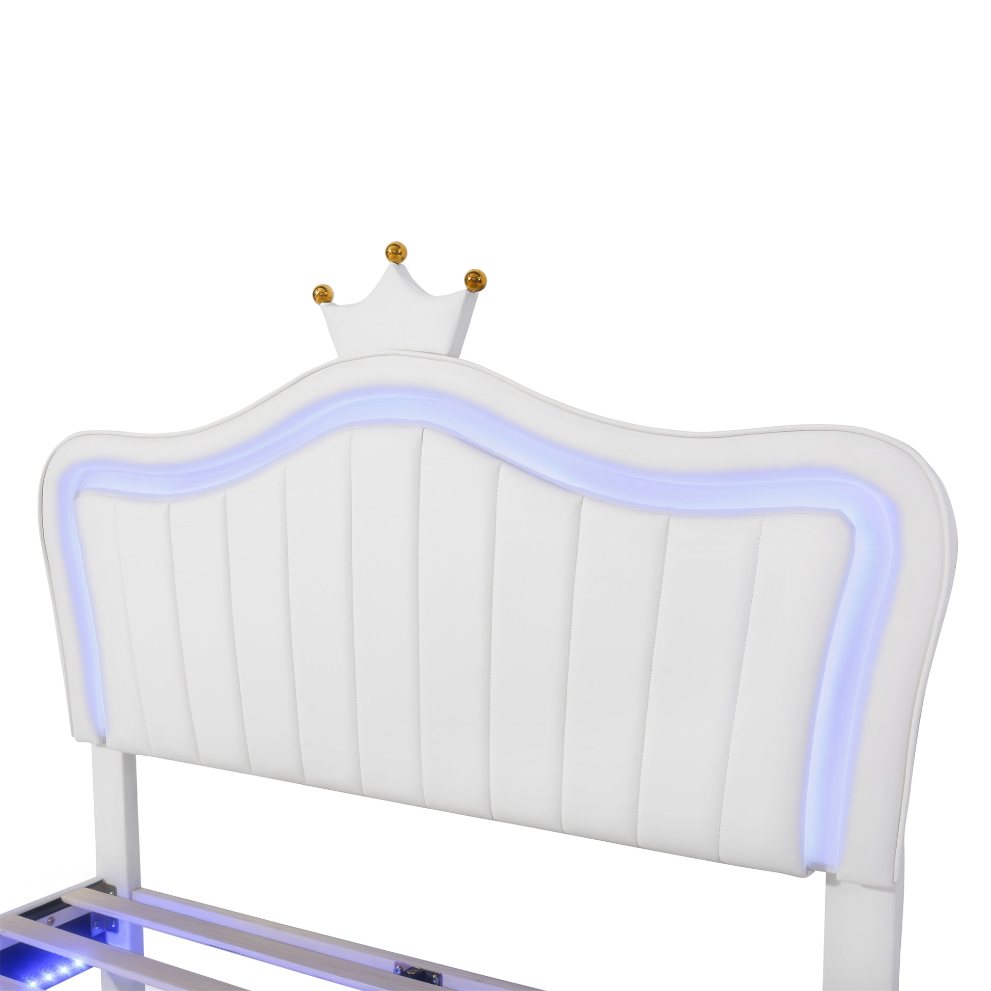 White upholstered headboard with crown detail and blue LED lighting