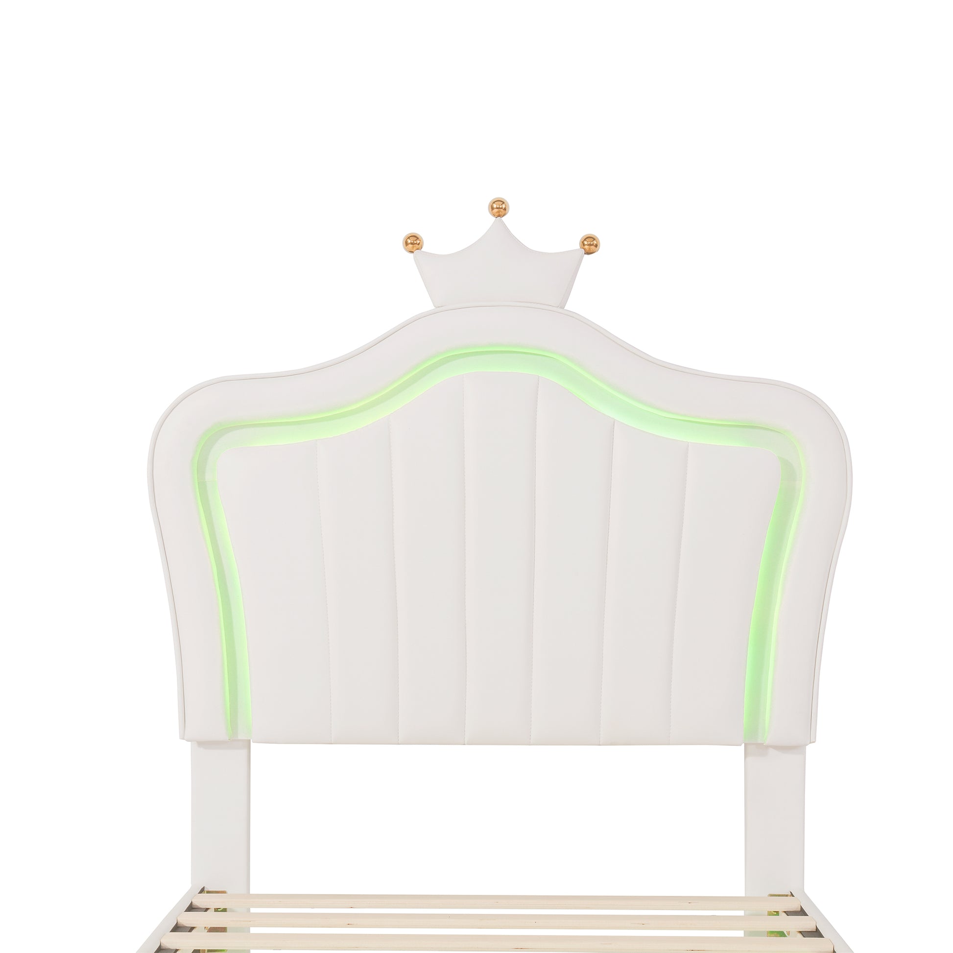 White upholstered headboard with crown detail and green LED lights