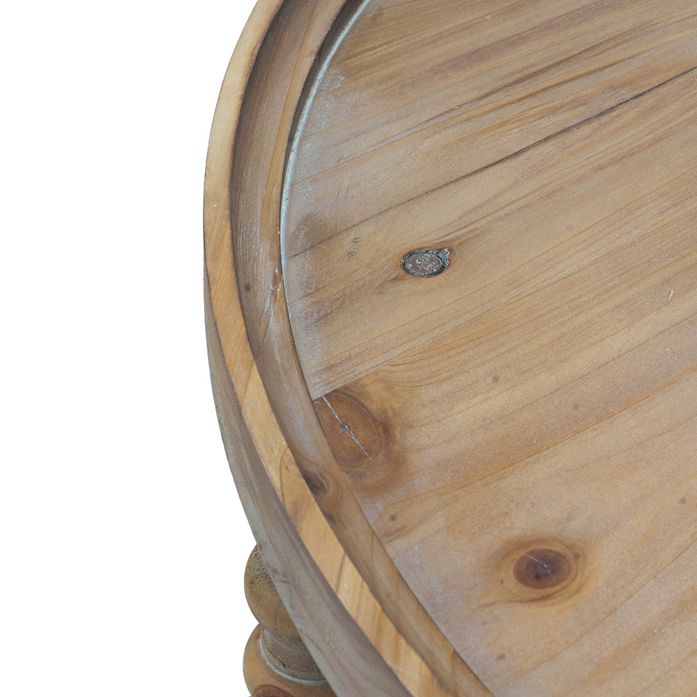 Closeup of natural wood grain on a round table top