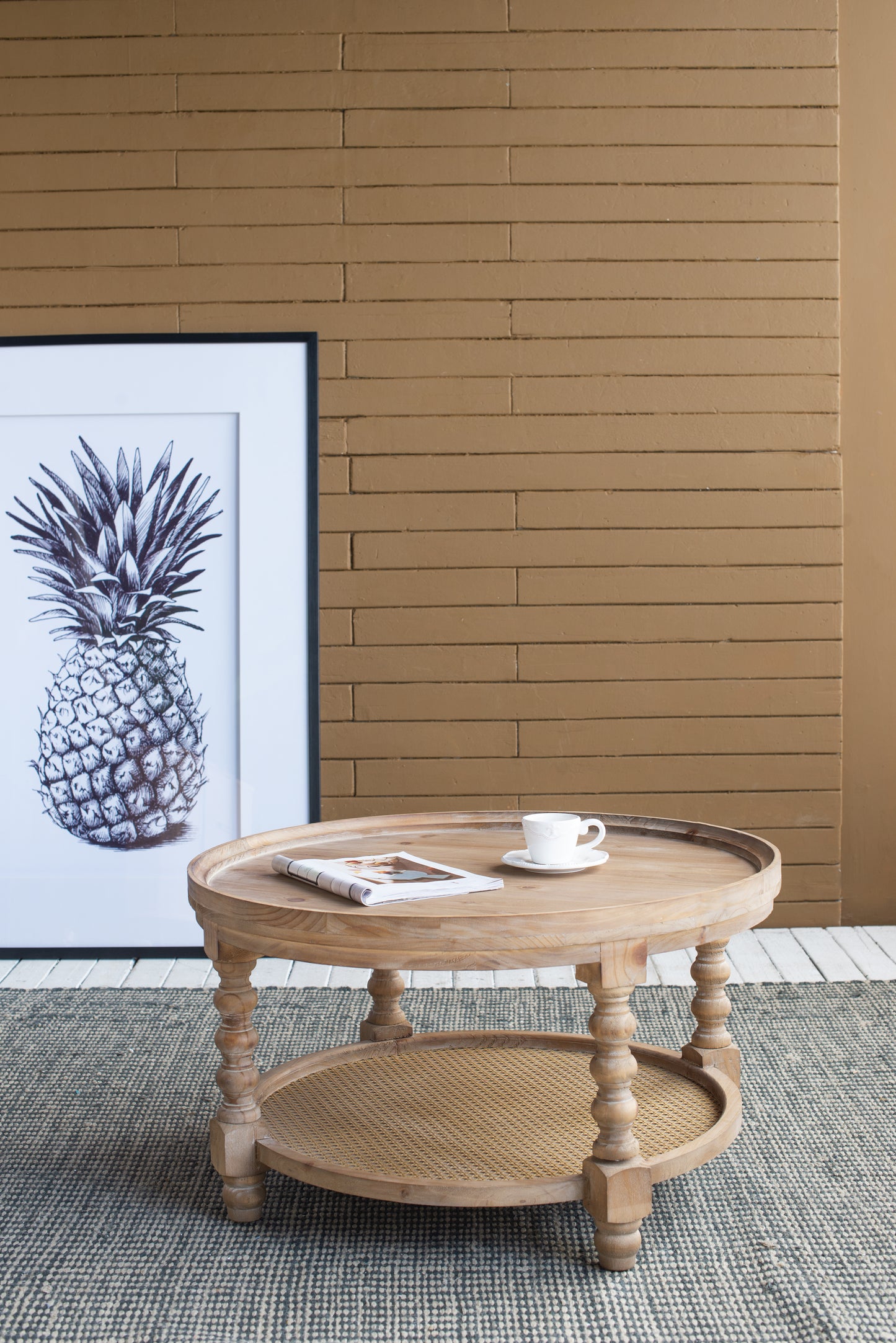 Wooden round coffee table with cane shelf and ornate legs