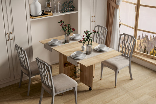 Wooden dropleaf dining table with  grey upholstered chairs set for four