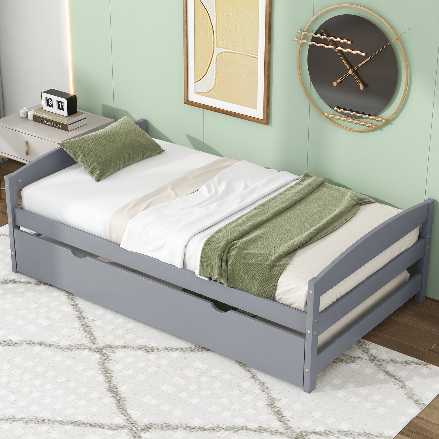 Gray wooden daybed with a pullout trundle for guest sleeping space
