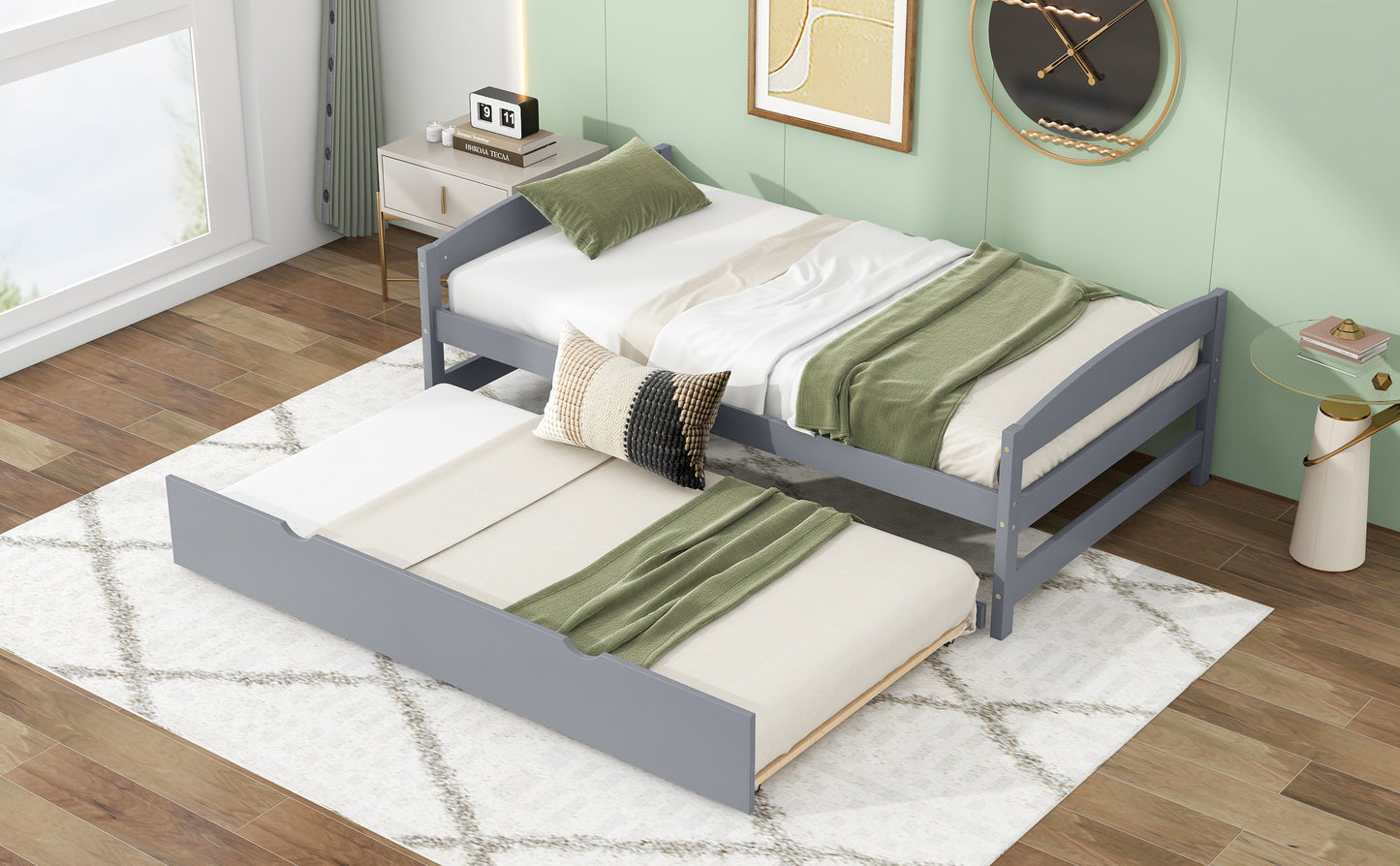Grey wooden twin daybed with a pullout trundle bed for guest room