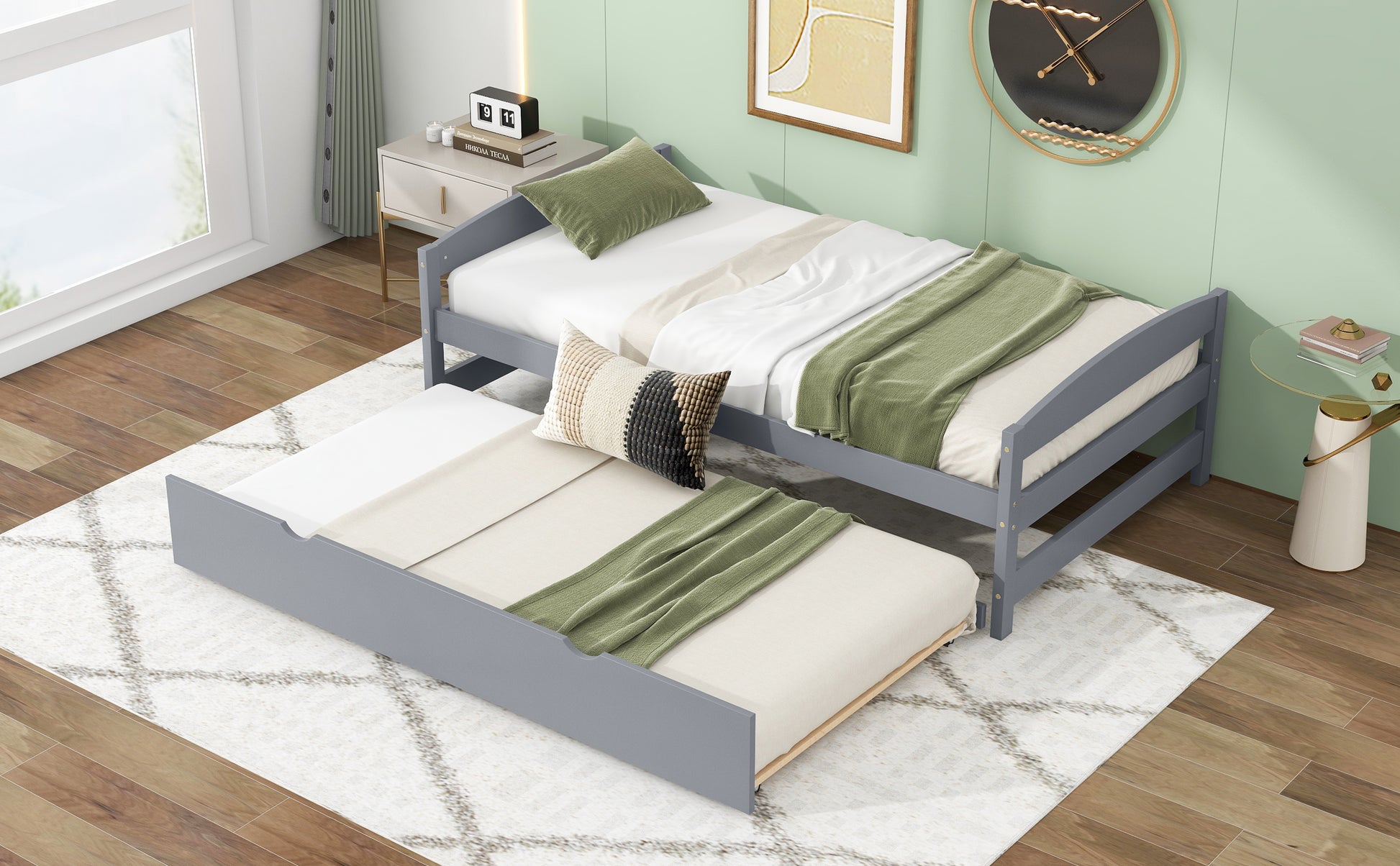 Grey wooden twin daybed with a pullout trundle bed for guest room
