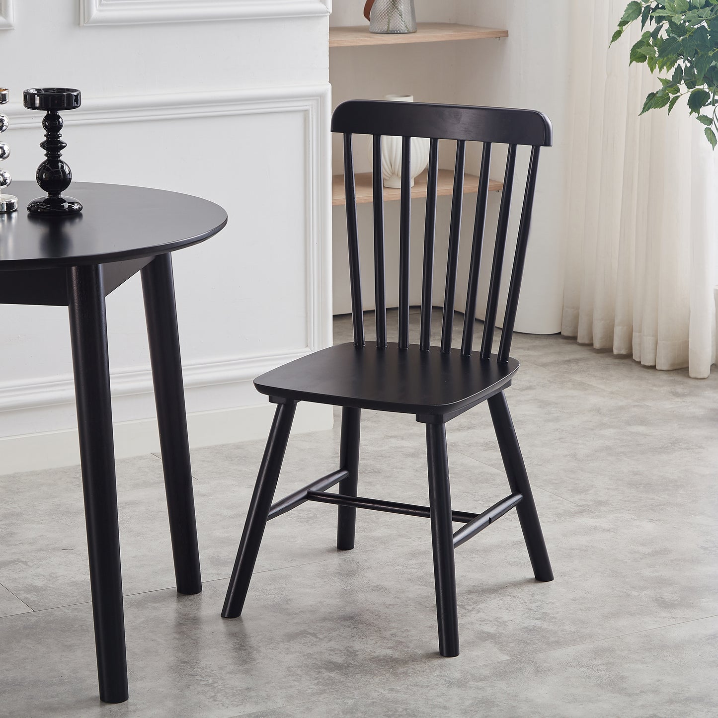 Black Windsor style chair with slatted back