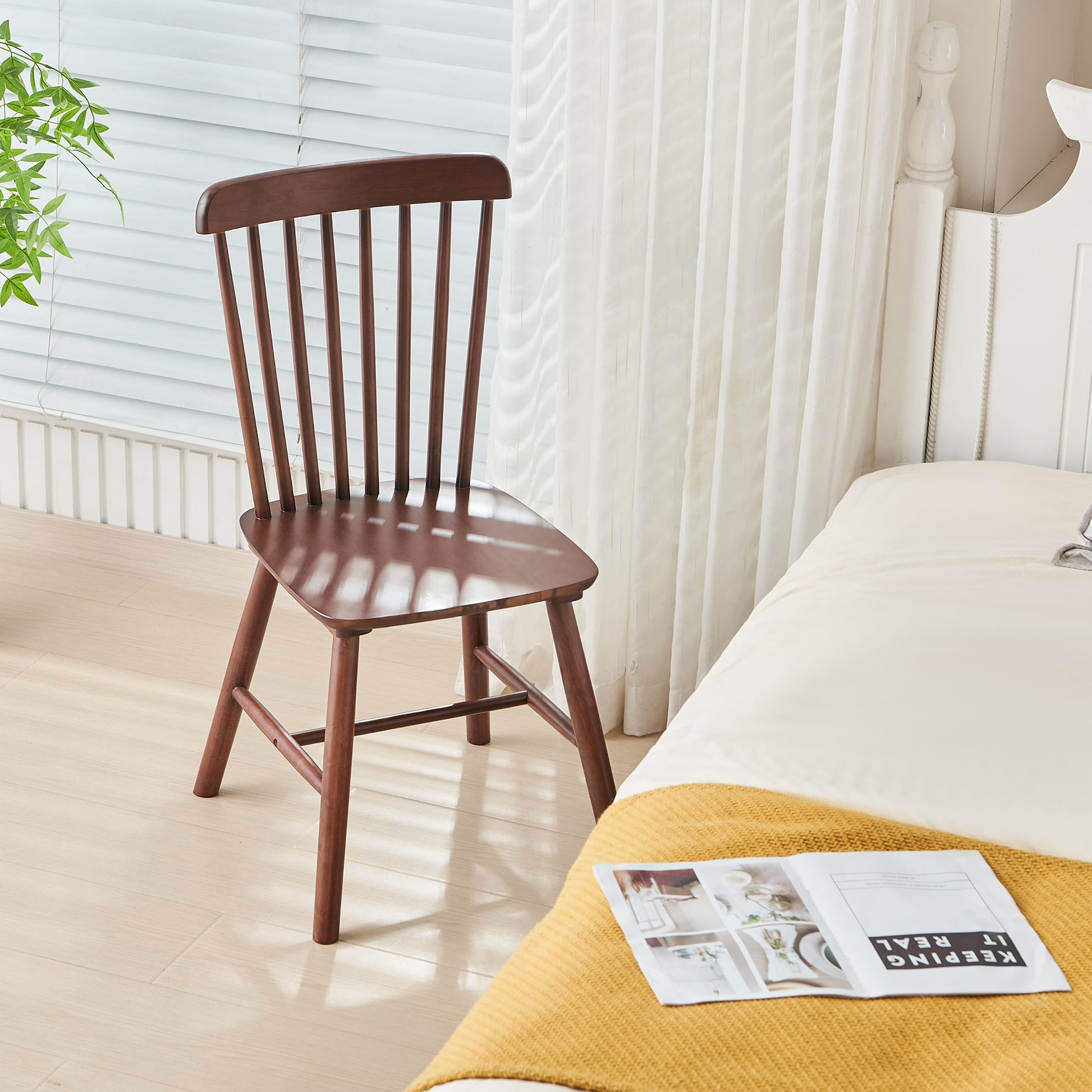 Wooden dining chair with spindle back