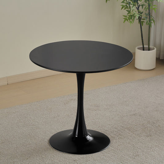 Black round metal tulip coffee table
