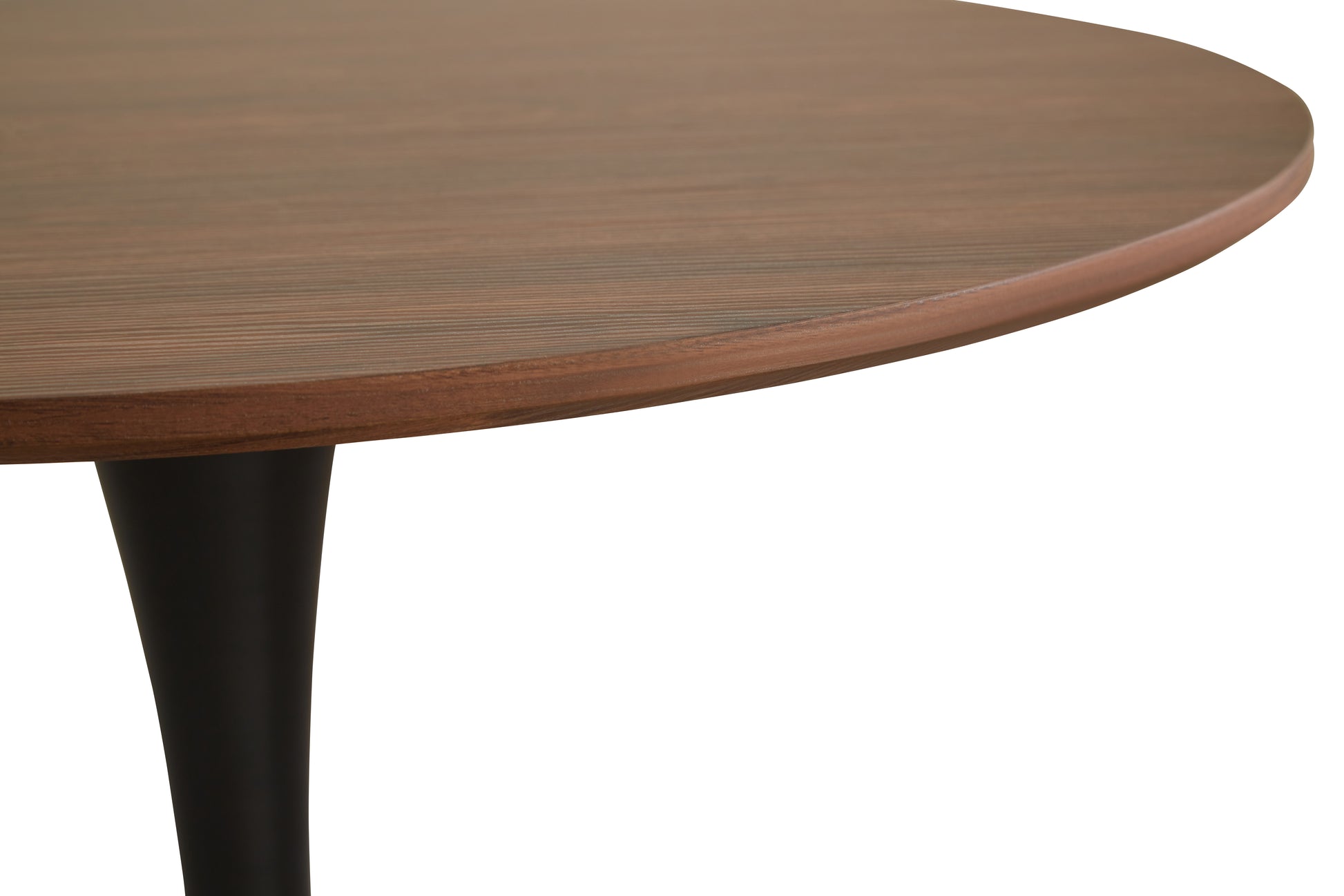 Round walnut wood dining table with ribbed texture and black tapered leg