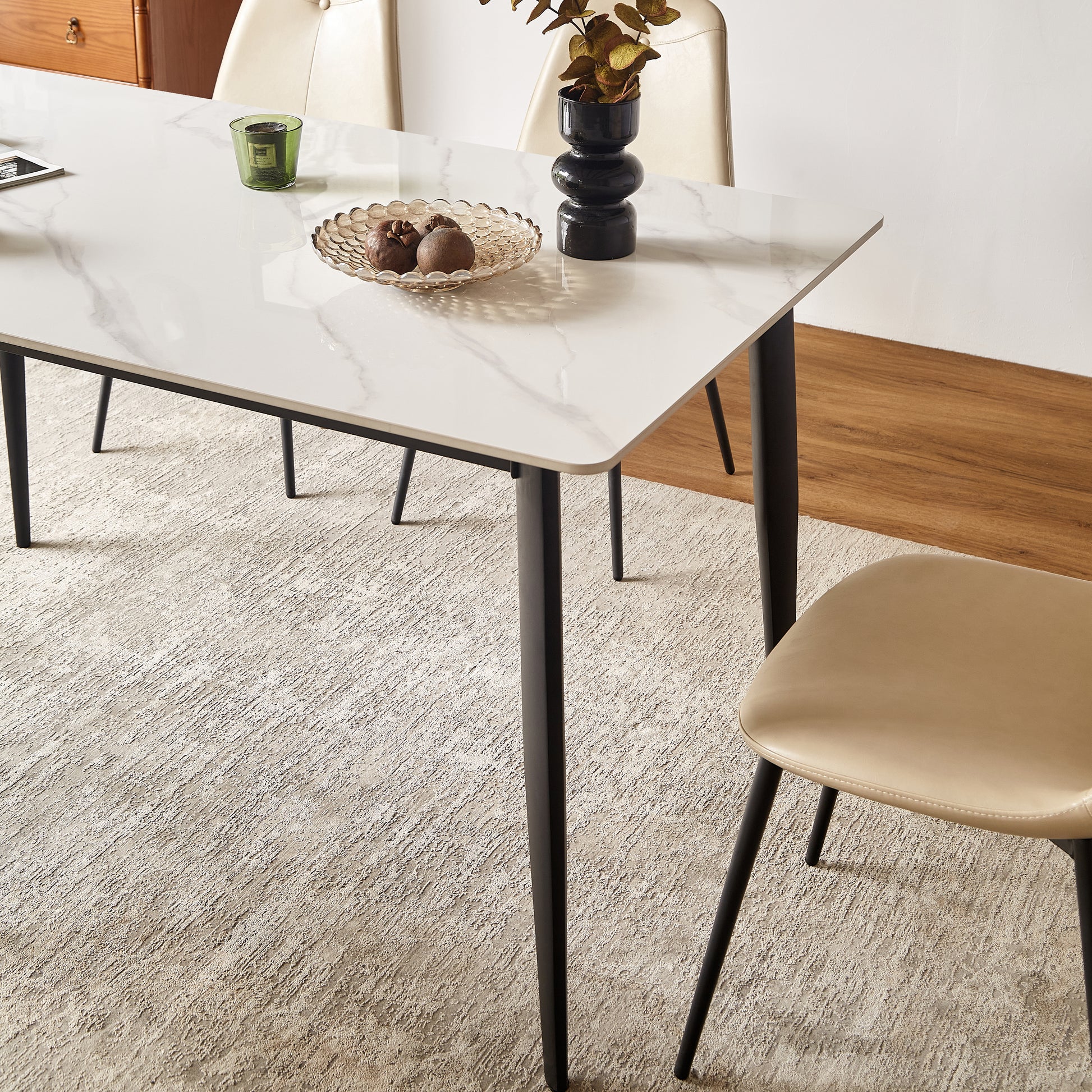 Modern white marble top dining table with black metal legs
