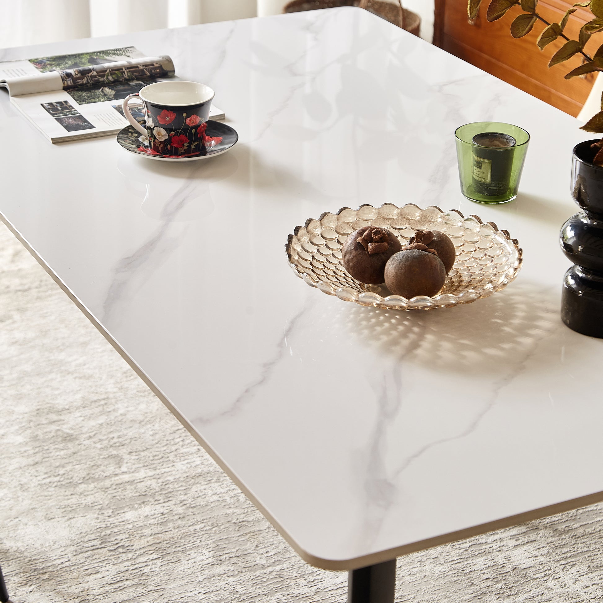 White marble effect dining table with rounded edges