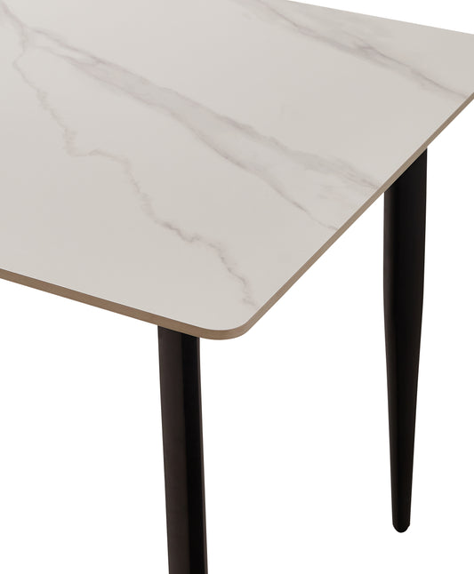 White marble top dining table with tapered black legs