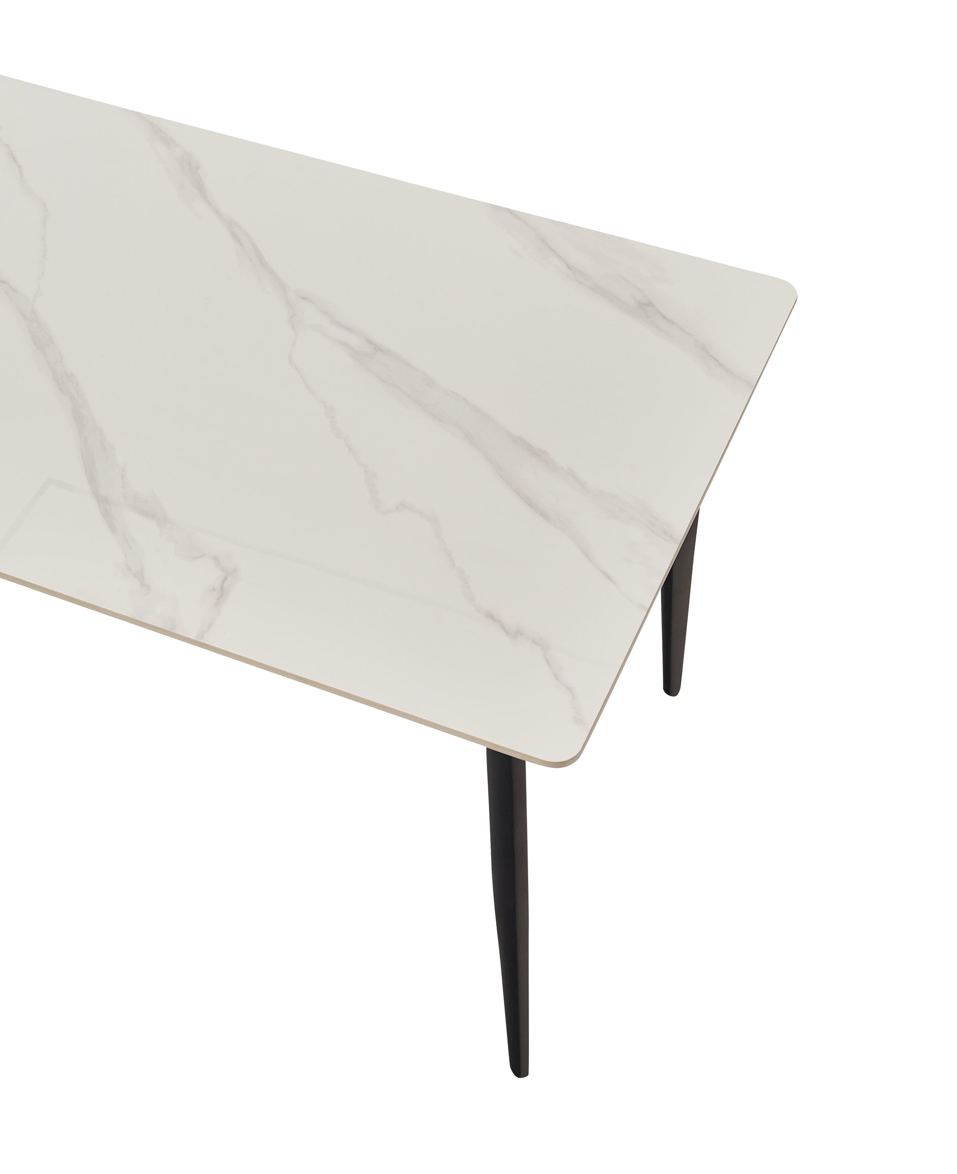White marble dining table with tapered black legs for modern kitchens