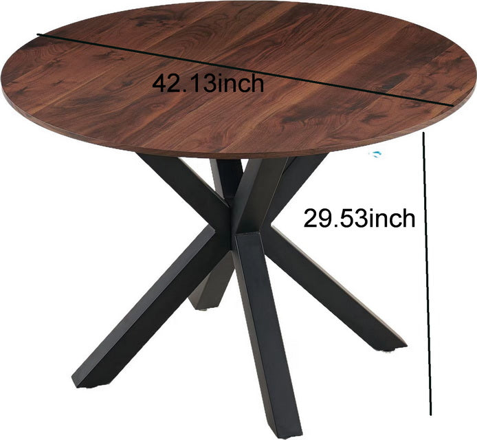 Round walnut veneer dining table with black metal pedestal base