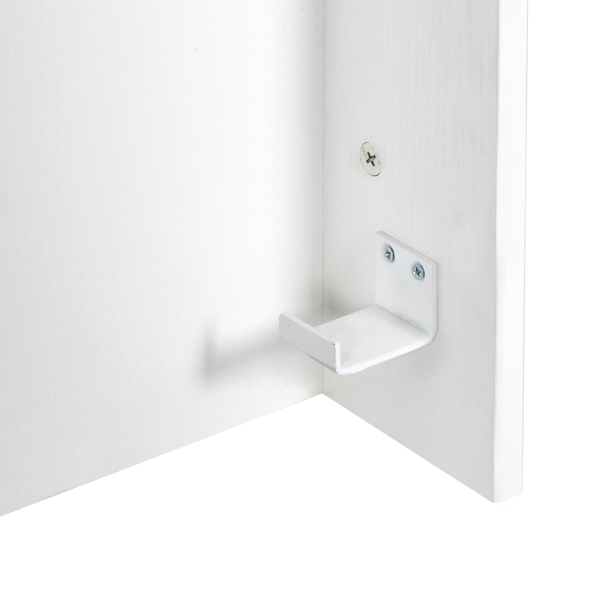 White metal shelf bracket with two screws attached to a white wooden surface