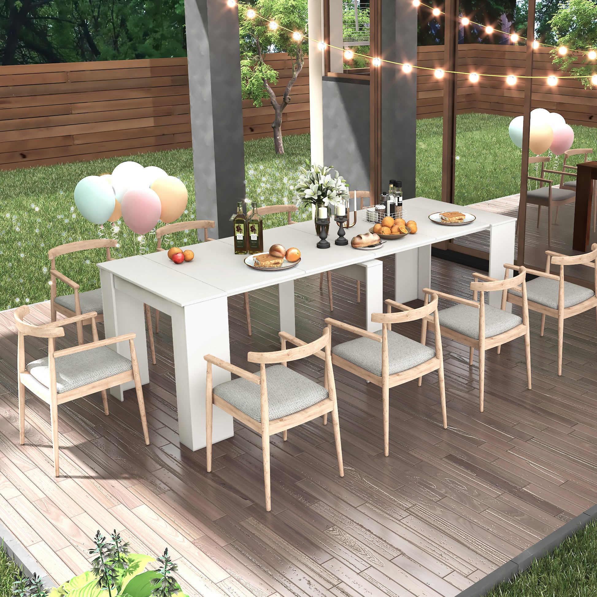 White extendable dining table with light wood chairs set for a meal