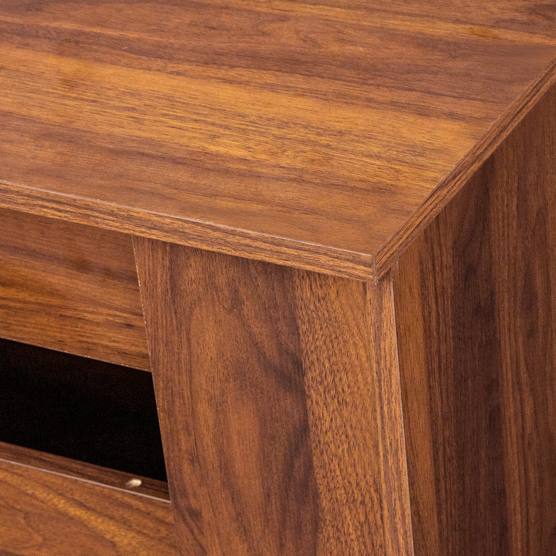 Warm walnut wood grain detail on modern furniture