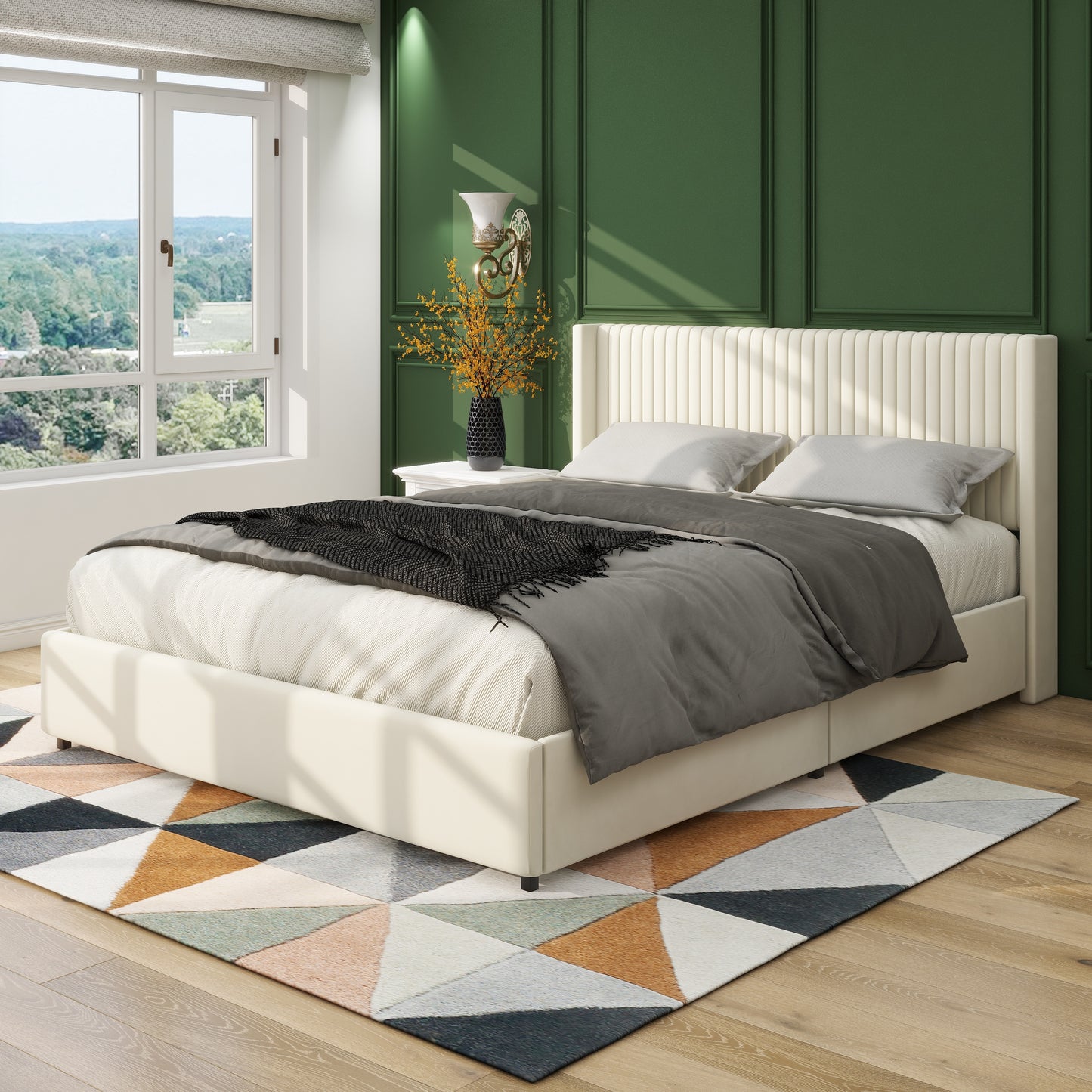 Cream upholstered platform bed with channel tufted headboard and grey bedding