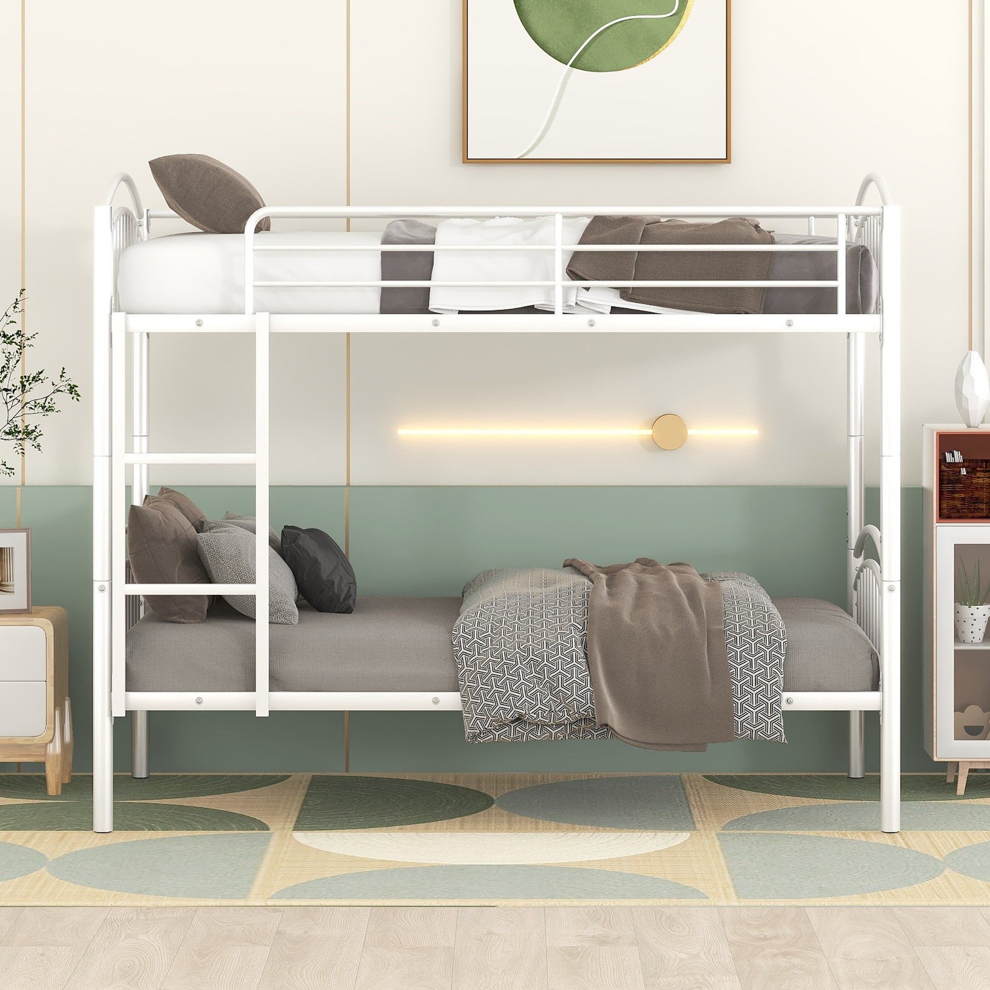 White metal bunk bed with stacked mattresses and pillows