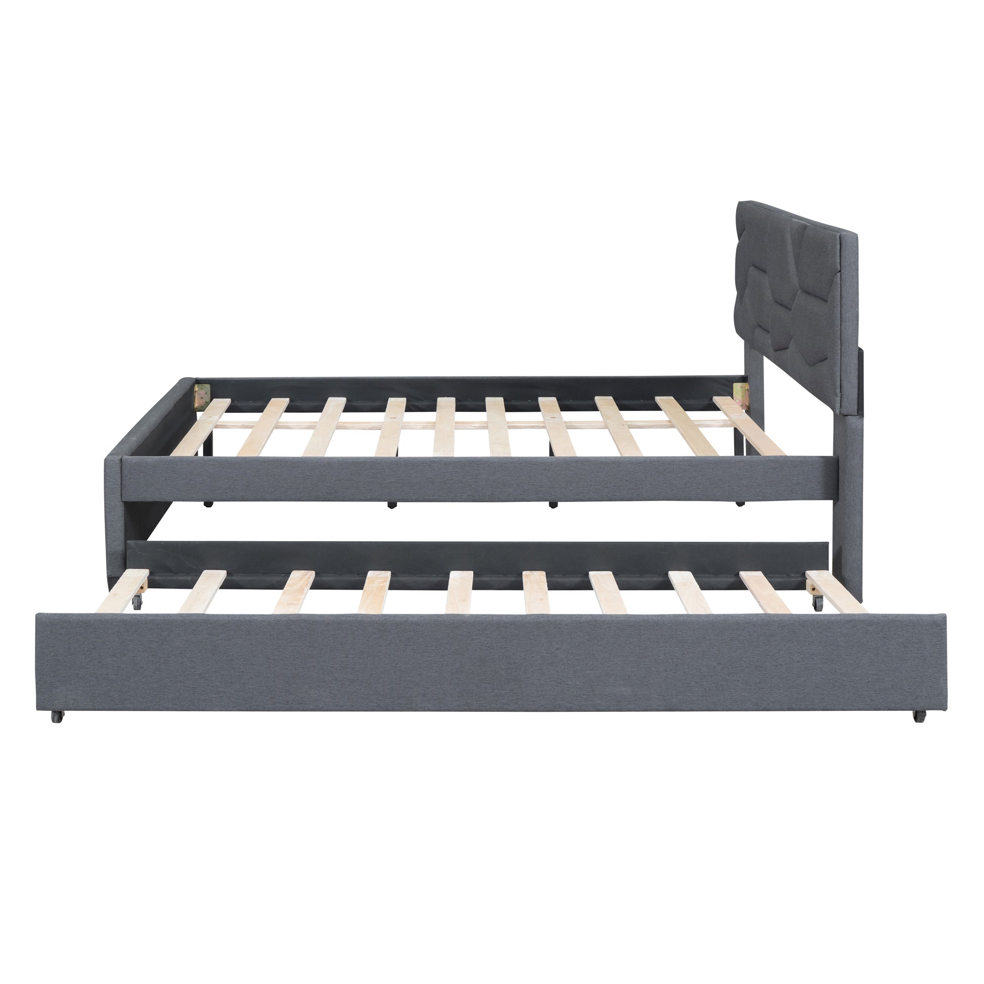 Grey upholstered bed frame with pullout trundle and wood slats