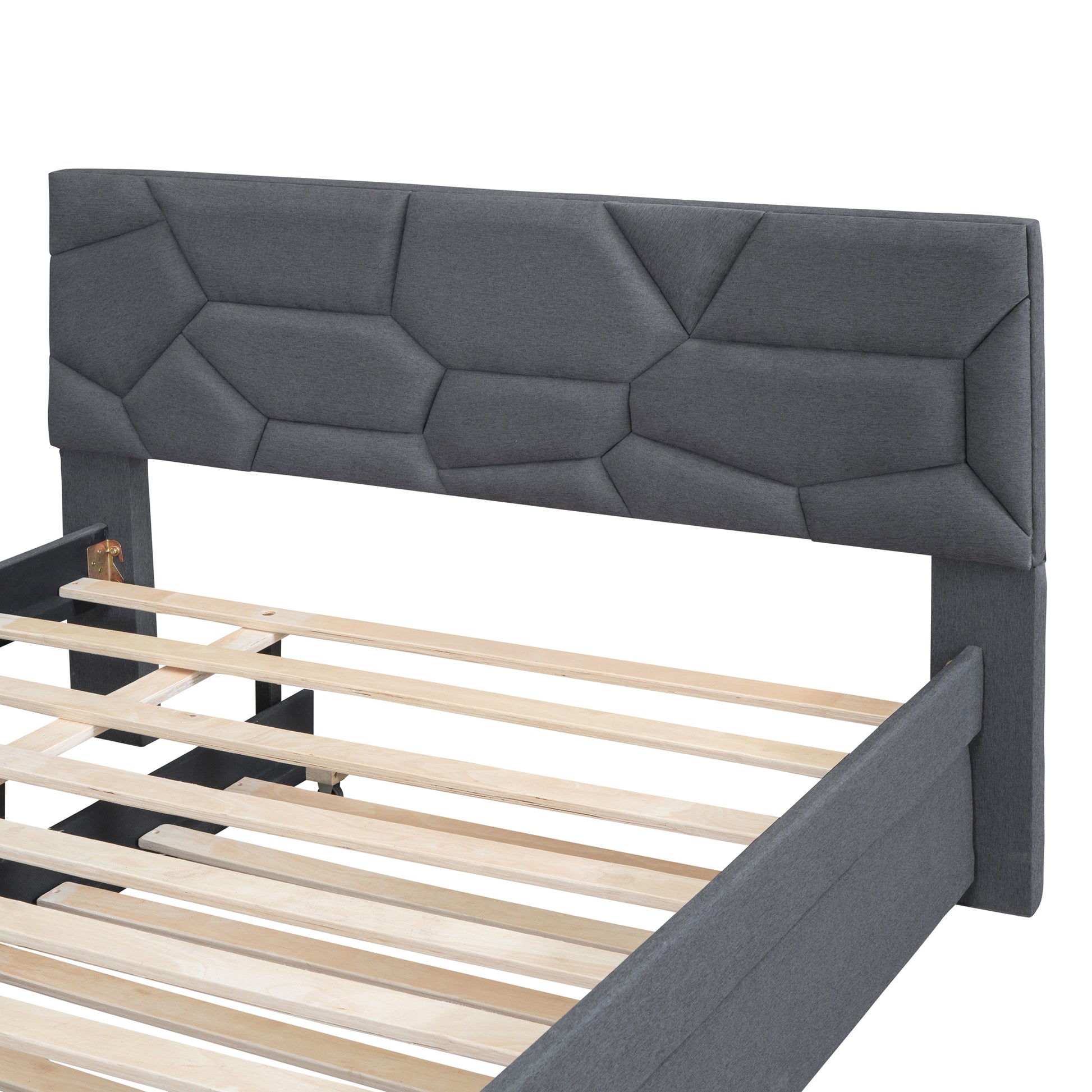 Geometric upholstered grey headboard on a modern bed frame with wooden slats