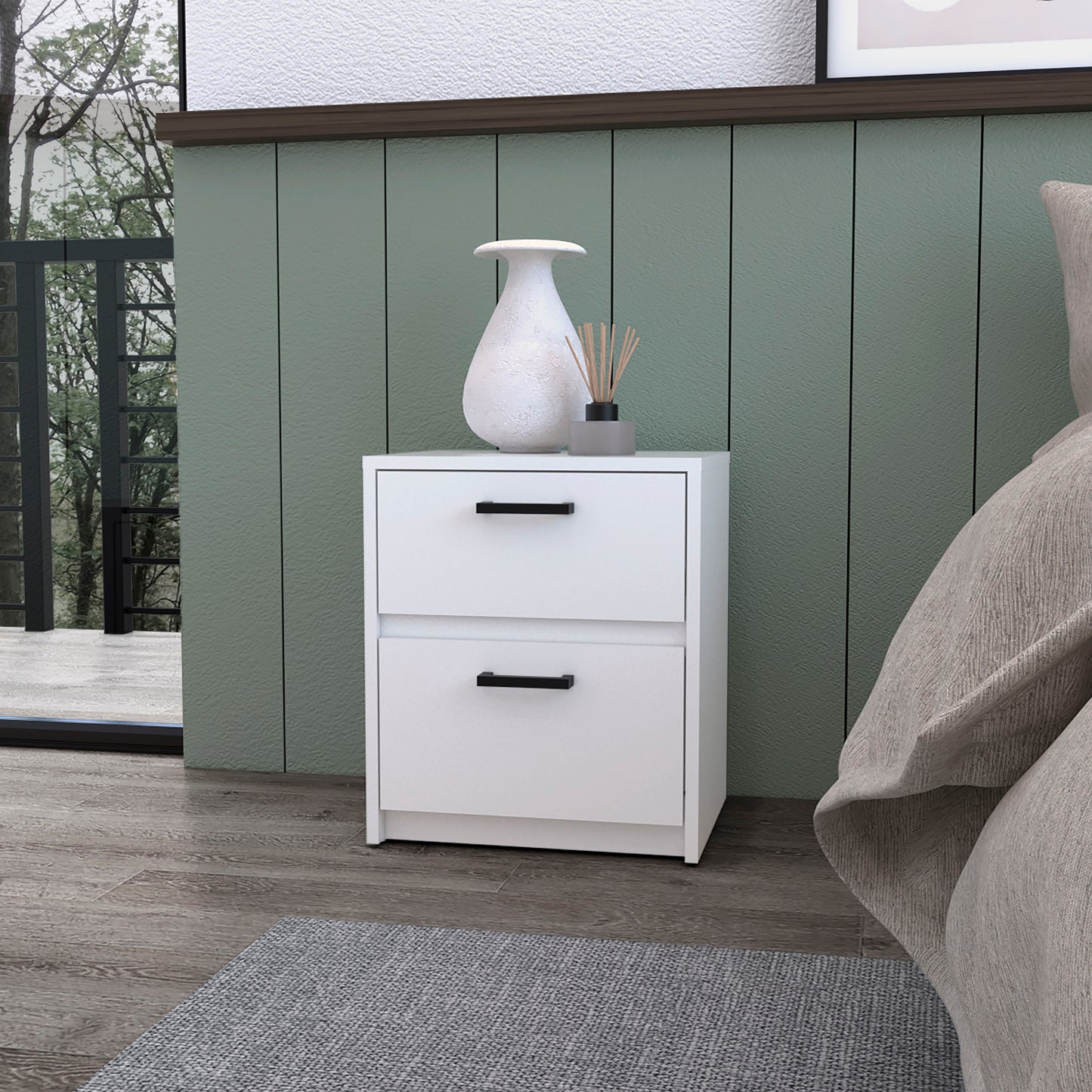 White twodrawer nightstand with black pull handles