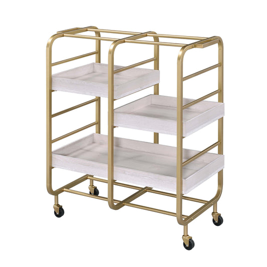 Modern gold bar cart with three tiered white wood shelves and caster wheels