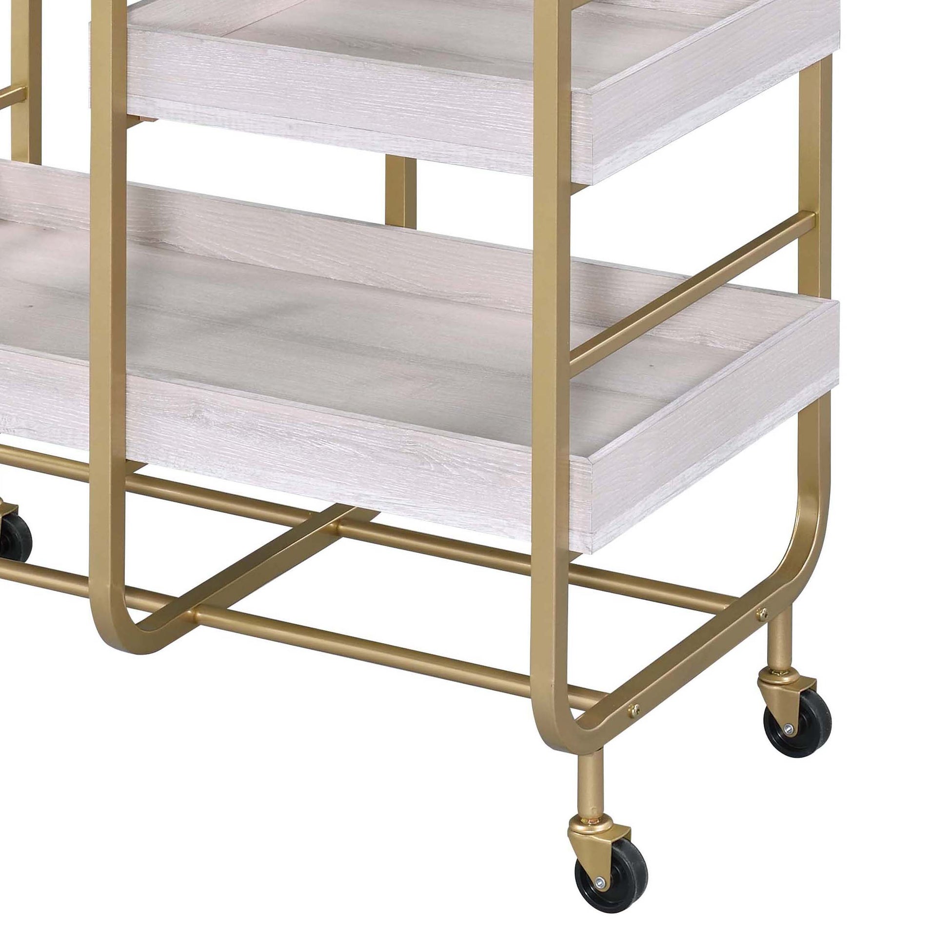Threetier serving cart with distressed white wood shelves and gold metal frame
