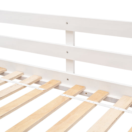 White wooden bed frame detail with natural wood slats and elastic strap for mattress support