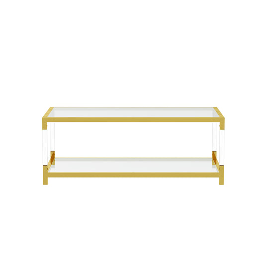 Modern gold coffee table with clear acrylic accents and glass top