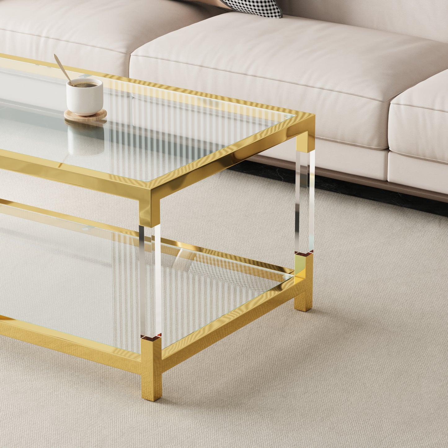 Modern gold and glass coffee table with acrylic legs