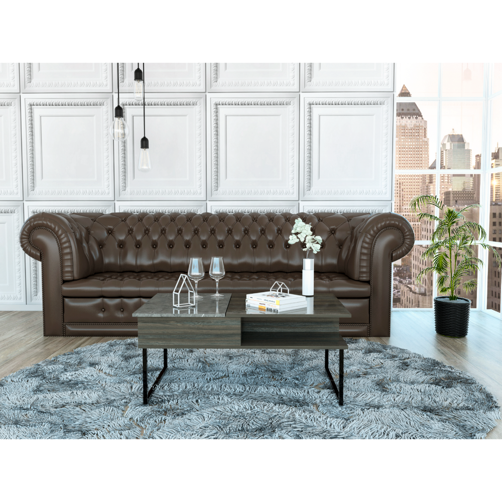 Brown leather chesterfield sofa with tufted details