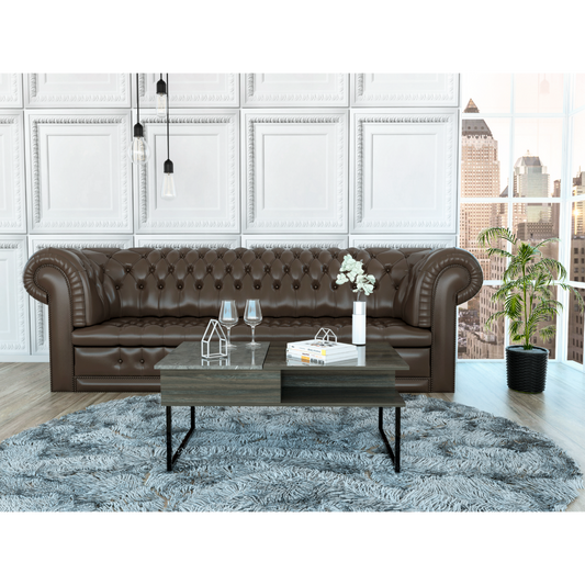 Brown leather chesterfield sofa with tufted details