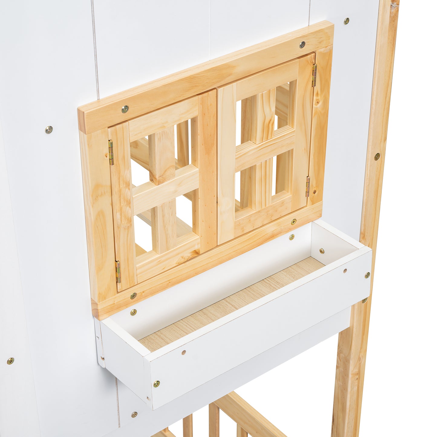 White wooden dollhouse with open window and planter box