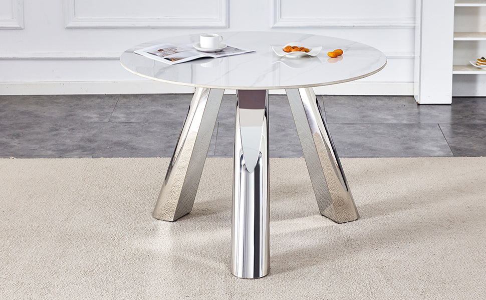 White marble round coffee table with polished chrome legs