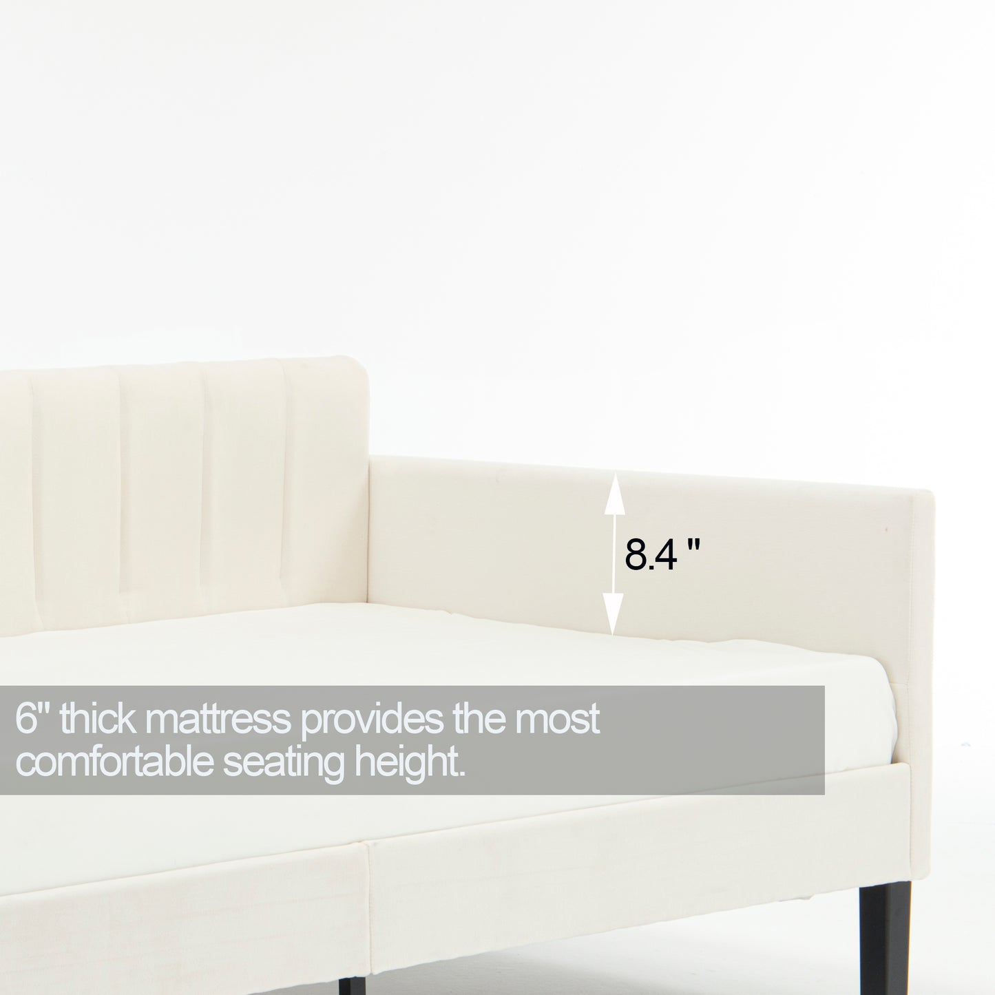 Cream upholstered daybed with channel tufting